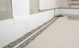 Basement Waterproofing Milton project featuring an interior drainage membrane, weeping tile, and gravel trench